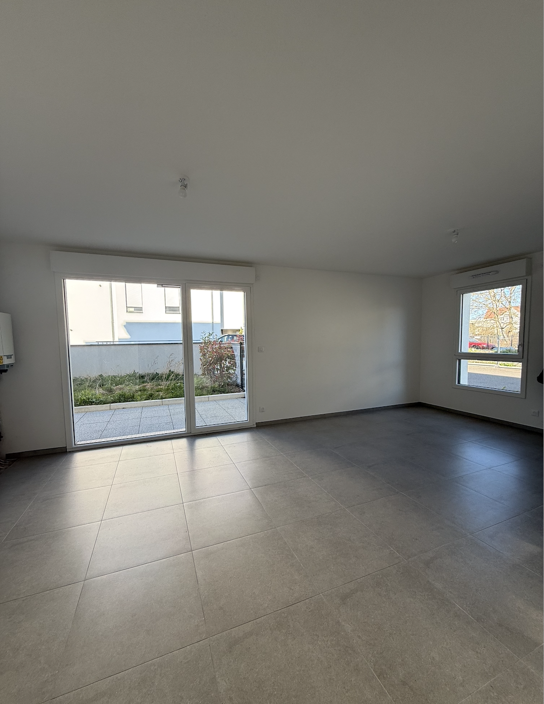 T3 en rez-de-jardin avec terrasse   Secteur frontalier Kembs - Image 2